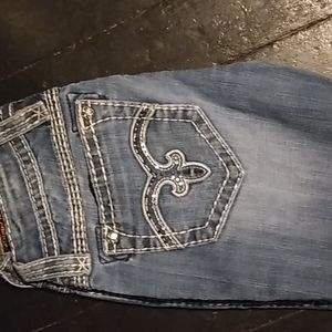 Rock revival jeans 28/35 there is a hole in the butt have pictures